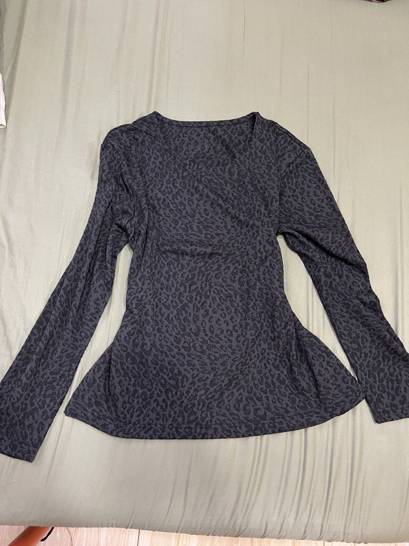 Black Grey Leopard Long Sleeve Peplum Top (Category: Longsleeves) located in Manila. Submitted by yan.decluttering (Listing ID 1468071553, Image 1). Description: - Color: Dark grey with all-over leopard print - Fit: Fitted waist with a flowy flared peplum hem - Neckline: Rounded scoop neck - Sleeves: Long sleeves - Material: Soft textured fabric with great stretch - Style: Casual and perfect for everyday wear.