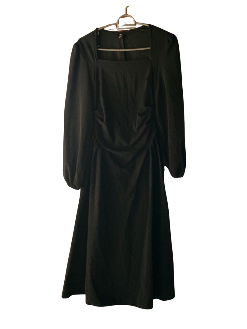 Black Long Sleeve Midi Dress Square Neck (Category: Dresses) located in Narvacan. Submitted by liusaidh (Listing ID 1468199679, Image 1). Description: Chic black midi dress featuring a flattering square neckline, long puff sleeves, and a fitted bodice with subtle ruching that flows into an A-line skirt. Made from a smooth, slightly stretchy fabric. Perfect for dinner dates and evening events!.