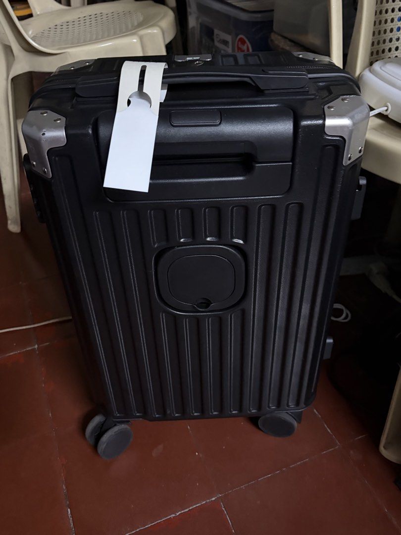Black Luggage (Category: Luggage) located in Pasay City. Submitted by nousejo (Listing ID 1468182409, Image 1). Description: - Color: Black - Design: lightweight construction - Mobility: Four rolling wheels - Interior: Grey lined with secure zipper compartments and compression straps - Best For: short flights.