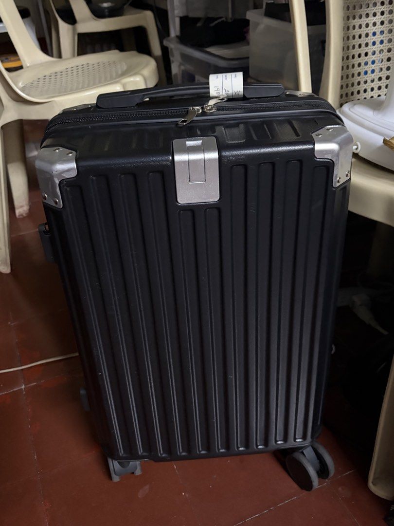 Black Luggage (Category: Luggage) located in Pasay City. Submitted by nousejo (Listing ID 1468182409, Image 2). Description: - Color: Black - Design: lightweight construction - Mobility: Four rolling wheels - Interior: Grey lined with secure zipper compartments and compression straps - Best For: short flights.