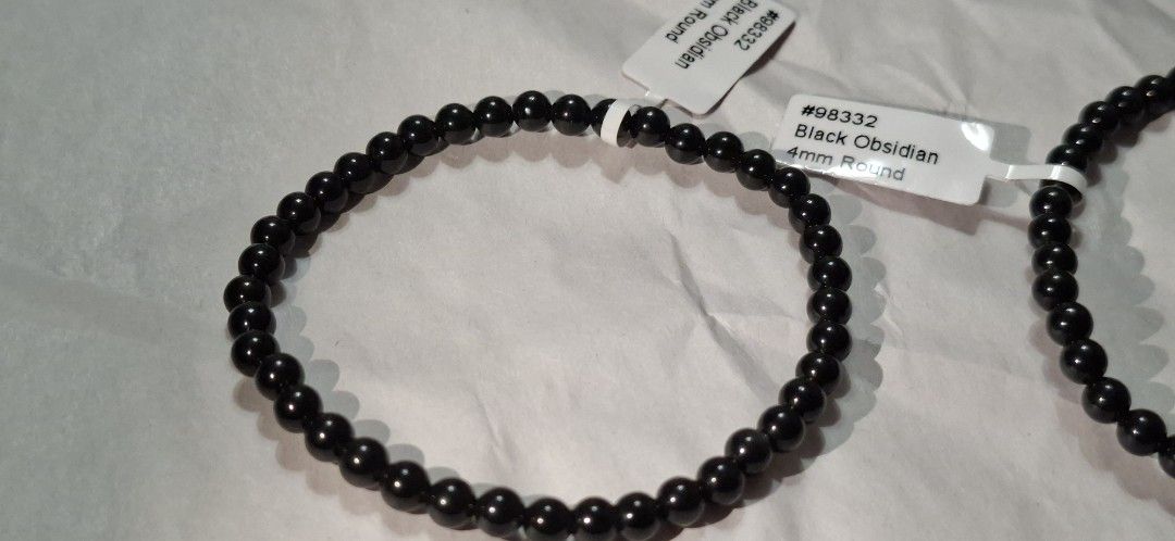 Black Obsidian 4mm Round Crystal Bead Bracelets Pair (Category: Bracelets) located in Quezon City. Submitted by satin_heart2026 (Listing ID 1468233423, Image 1). Description: - black obsidian bead bracelets - 4mm smooth, glossy round beads - Stretchy cord for a comfortable fit on most wrist sizes - Brand new with original manufacturer tags attached. - made by canadian jeweler. -price quoted per bracelet..