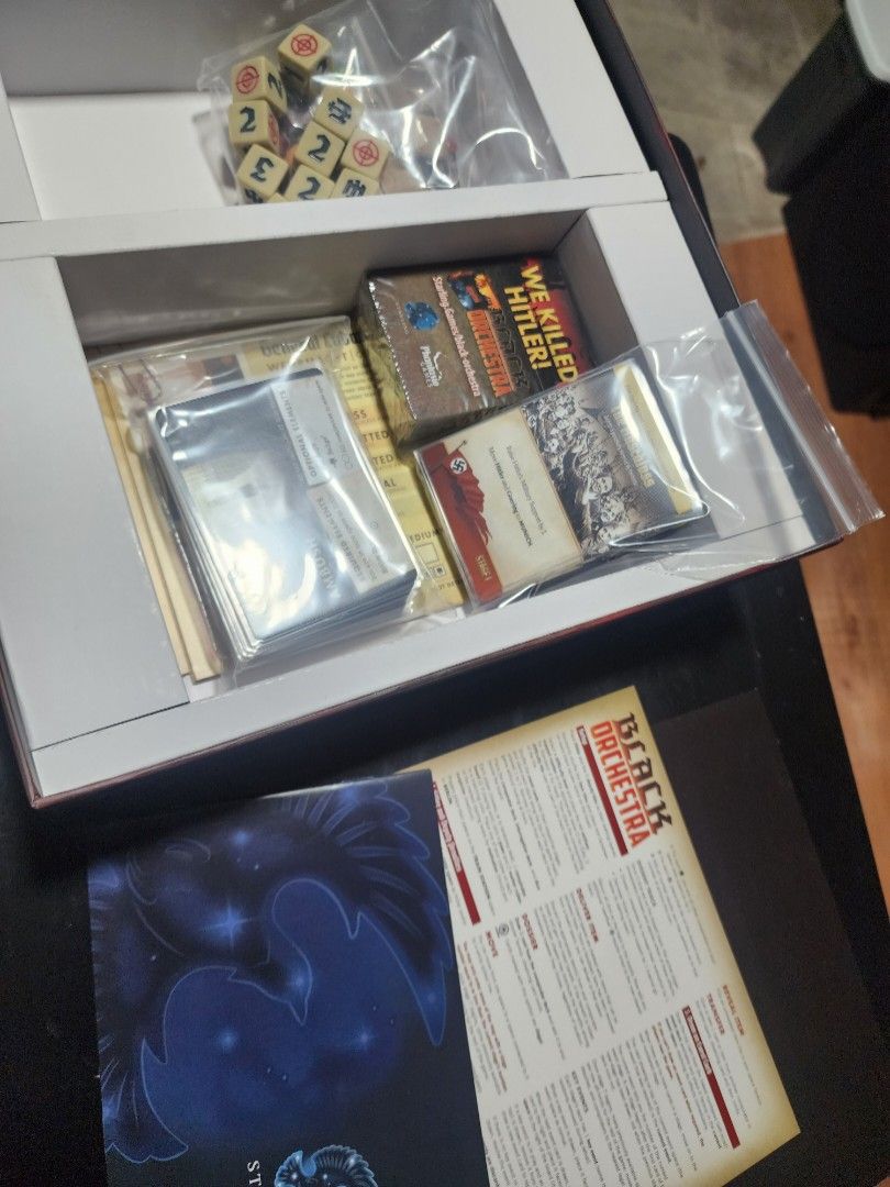Black Orchestra Board Game 2nd Ed (Category: Board Games & Puzzles) located in Quezon City. Submitted by gareki99 (Listing ID 1468129262, Image 2). Description: FOR SALE: Black Orchestra Board Game – Opened, Unplayed ₱2,800 📦 Condition: Like New (unplayed) Selling my copy of Black Orchestra, a cooperative historical board game where players work together to plot against Hitler during World War II. ✅ Opened only to check the contents ✅ Never play