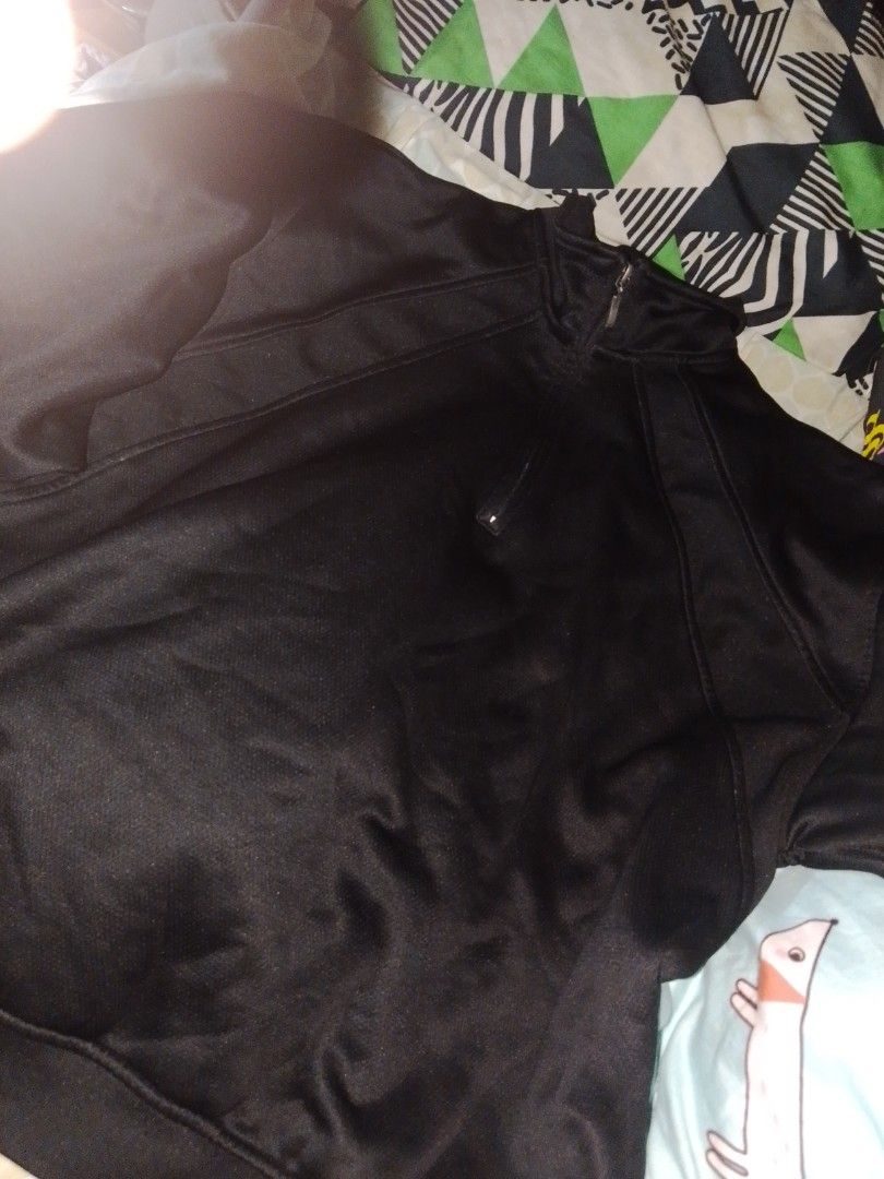 Black Quarter Zip Sweatshirt Pullover (Category: Coats, Jackets and Outerwear) located in Manila. Submitted by wildwind.284adc (Listing ID 1468272835, Image 1). Description: - Color: Solid black - Design: Half-zip collar with straight panel stitching on the chest and shoulders - Features: Textured body fabric, ribbed hem and cuffs - Versatility: Simple sporty design, perfect for casual days or workouts - Fit: Easy to throw on and style.