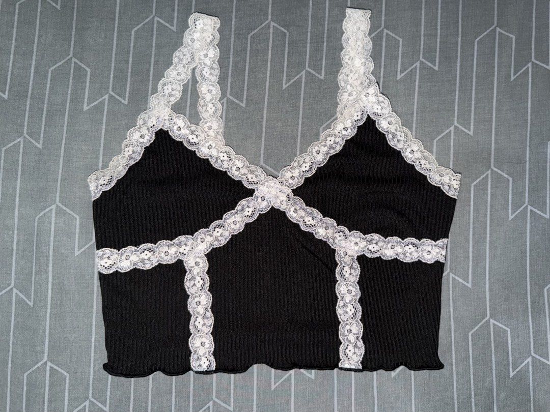 Black Crop Top with White Lace (Category: Sleeveless) located in Orion. Submitted by cievxhv (Listing ID 1468279816, Image 1). Description: ✨ black ribbed lace cami top ✨ delicate white lace detailing ✨ crisscross lace design at the front ✨ cropped fit, perfect for layering or going out ✨ easy to pair with jeans, skirts, or shorts ✨ rfs: decluttering 📦 shipping via j&t express 💸 payment via gcash.