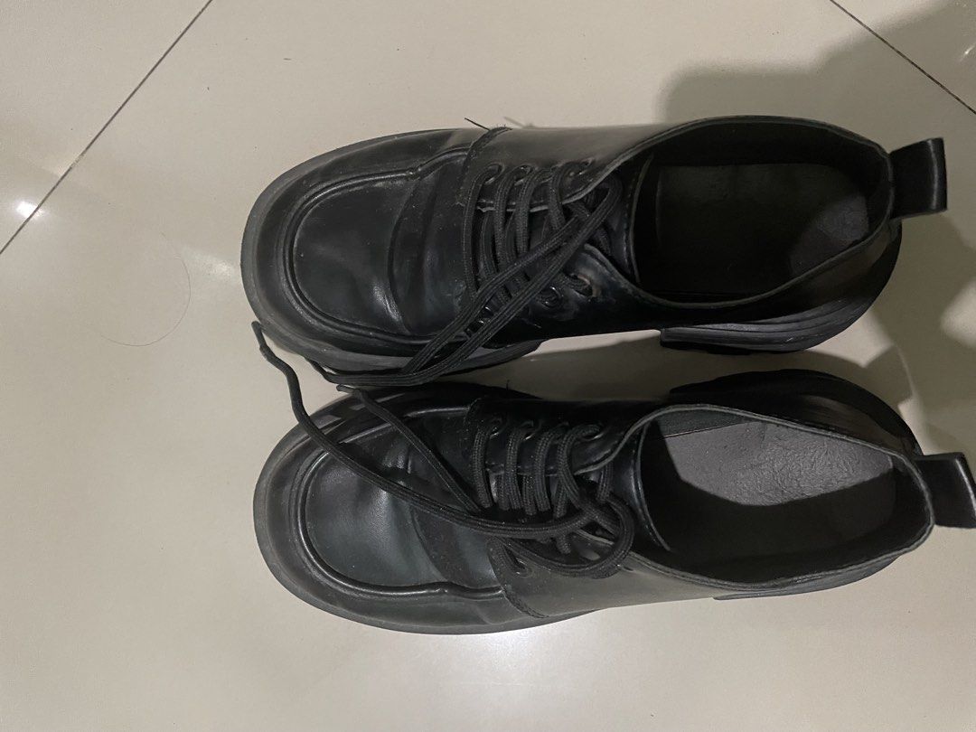 Black Shoes Size 38 (Category: Heels) located in Manila. Submitted by liart_04 (Listing ID 1468234993, Image 2). Description: - Color: Black - Style: Platform shoes with thick lug soles and low heel - Closure: Front lace-up - Size: 38 (marked on sole) - Condition: Worn a few times, minor wear and dirt on soles - RFS: Closet decluttering - Mode of Payment: GCash or BPI - Shipping: Via J&T or Same-Day Delivery (Buyer bears shipping fee).