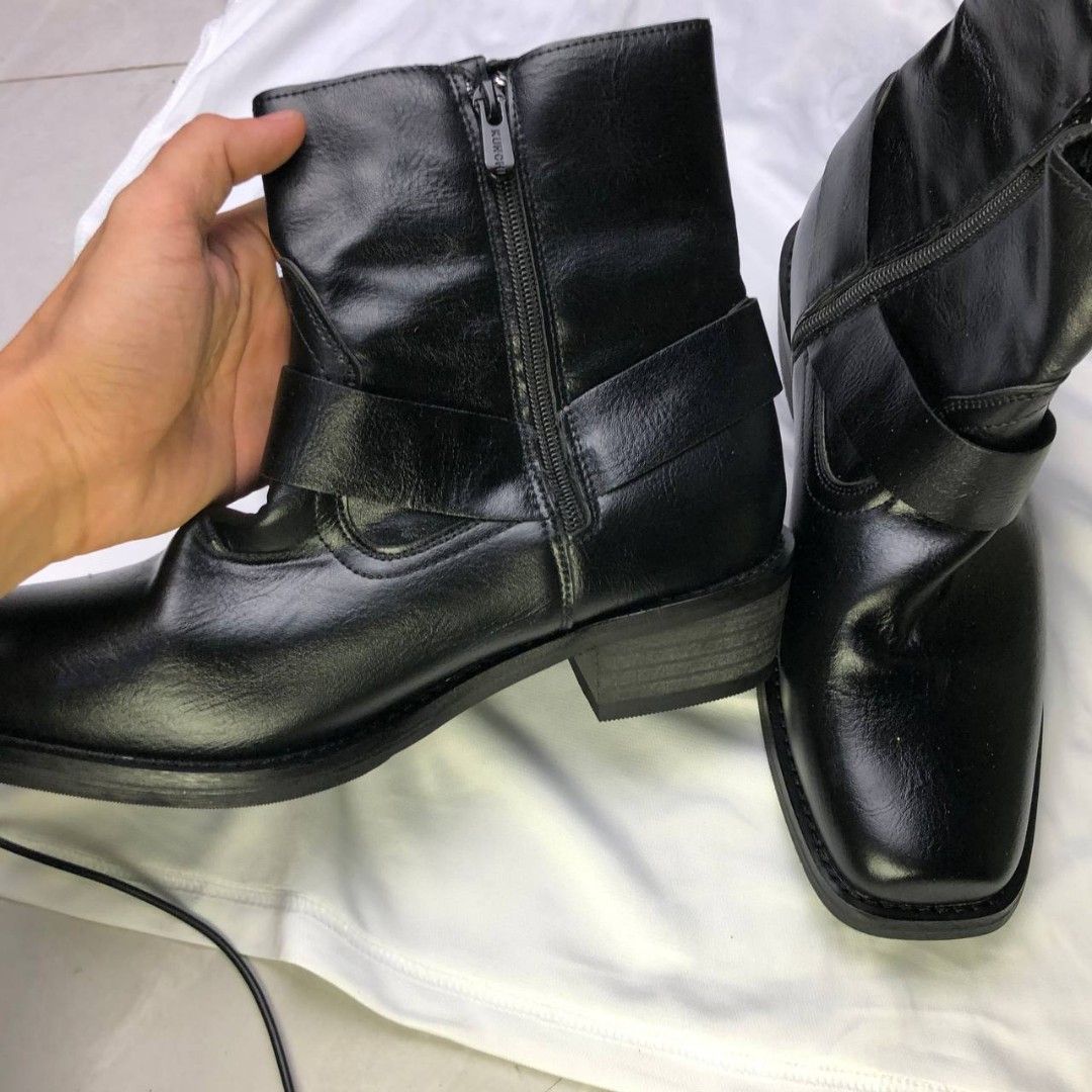 Black Zip-Up Ankle Boots (Strap Accent) (Category: Shoe inserts) located in Cavite. Submitted by ace.hanro (Listing ID 1468167261, Image 2). Description: Black Zip-Up Ankle Boots (Strap Accent) Sleek black ankle boots featuring side zippers and a stylish strap design. Great condition, stylish, and comfortable for everyday wear! Brand: Kurchi Color: Black Condition: Brand New Size: 8 Price: ₱ 800 📍 Payment/Shipment: GCash / Lalamove / J&T / Meetu
