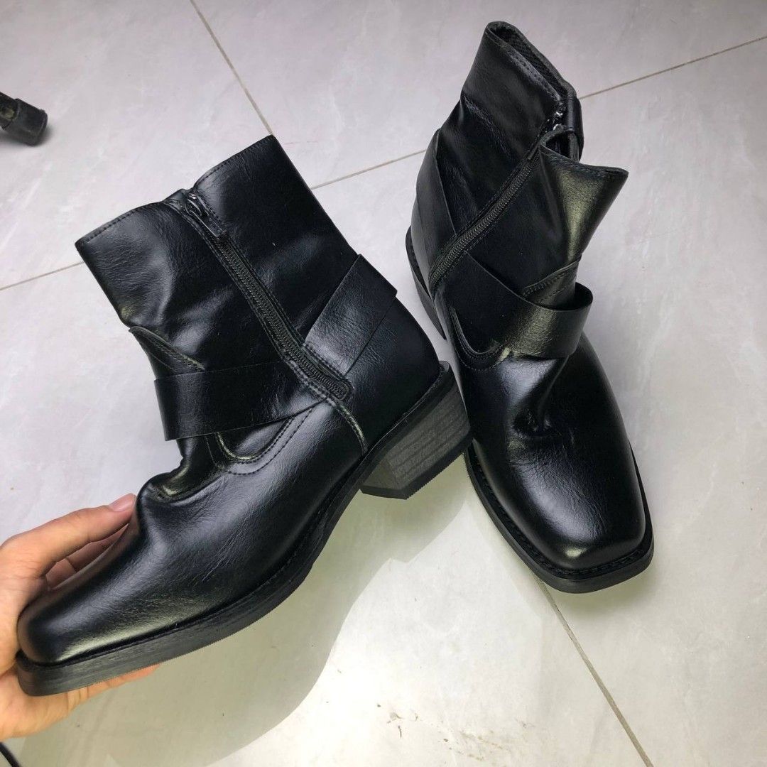 Black Zip-Up Ankle Boots (Strap Accent) (Category: Shoe inserts) located in Cavite. Submitted by ace.hanro (Listing ID 1468167261, Image 1). Description: Black Zip-Up Ankle Boots (Strap Accent) Sleek black ankle boots featuring side zippers and a stylish strap design. Great condition, stylish, and comfortable for everyday wear! Brand: Kurchi Color: Black Condition: Brand New Size: 8 Price: ₱ 800 📍 Payment/Shipment: GCash / Lalamove / J&T / Meetu