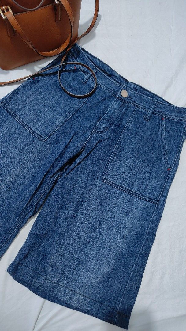 Blue Denim Shorts with Front Pockets (Category: Shorts) located in Bacolor. Submitted by annjjjjj (Listing ID 1468081946, Image 1). Description: - Style: High-waisted denim shorts - Wash: Medium wash - Details: Large front patch pockets, button closure, belt loops - Accent: Unique red stitching near pockets - Fit & Use: Comfortable for everyday wear and easy to pair with tees or tanks.