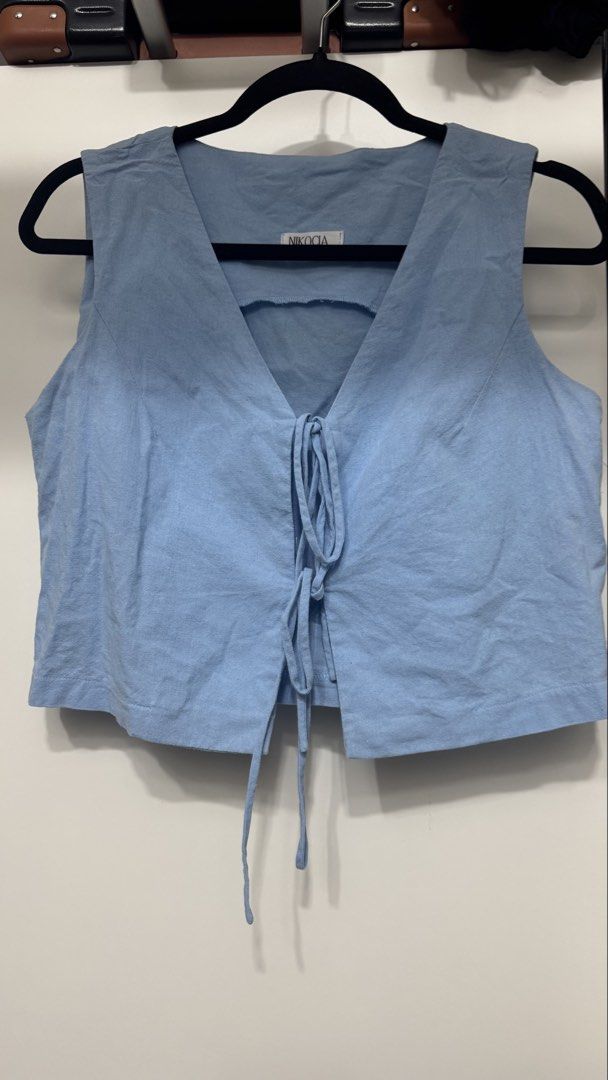 Blue Linen Ribbon Tie Front (Category: Sleeveless) located in Mandaluyong City. Submitted by _rizaespiritu (Listing ID 1468098962, Image 1). Description: - bought it from the blue app - used twice only.