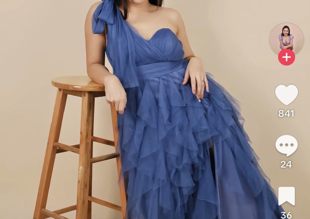 Blue One-Shoulder Tulle Ruffle Maxi Dress (posted price is for rent, different rate if for sale) (Category: Dresses) located in Cebu City. Submitted by jnmryyy (Listing ID 1468200287, Image 2). Description: - Color: Dusty Blue - Material: Layered tulle ruffles - Design: One-shoulder strap with decorative ribbon, fitted structured sweetheart bodice, and high side slit - Condition: Worn once for a photoshoot, carefully stored in wardrobe - Ideal Fo