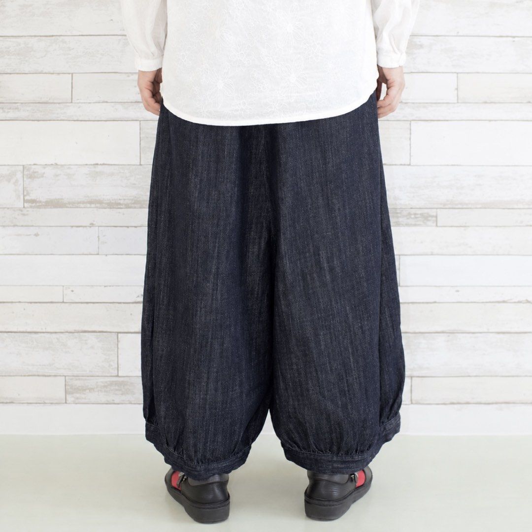 BLUE TRICK Japan Made Denim Circus Pants (Category: Jeans) located in Puerto Princesa. Submitted by terdsthrift (Listing ID 1468258687, Image 3). Description: BLUE TRICK Japan Made Denim Circus Pants Waist: 28-34 Length: 34.5 Thigh: 18 Hem: 13 In Excellent Condition / No Issue Color Rate: 10/10 - Brand: Blue Trick (Made in Japan) - Style: Dark wash denim balloon pants with a rounded leg and tapered cuffs - Size: Free size with a comfortable elast