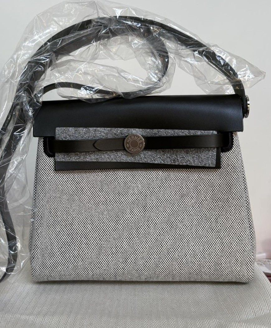 Bnew Hermes Mini Herbag (Category: Luxury Bags & Wallets) located in Quezon City. Submitted by shop.mar.go (Listing ID 1468060109, Image 2). Description: bnew mini herbag black in gold hardware panda in PHW.