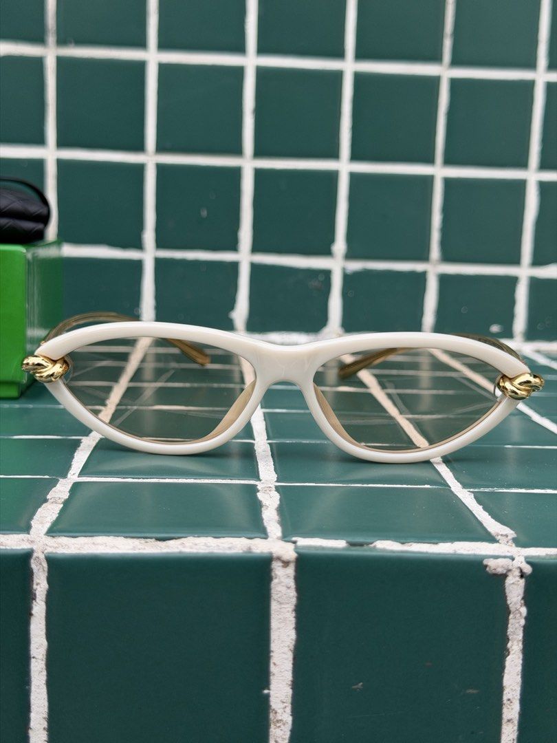 BOTTEGA VENETA (Category: Luxury Accessories) located in Angeles City. Submitted by secondluxph (Listing ID 1468192327, Image 1). Description: -BOTTEGA VENETA KNOT CAT-EYE SUNGLASSES -BV1390S -BEIGE/SHINY BUTTER FRAME WITH SOLID LIGHT GREY/BROWN TRANSPARENT LENSE (rare colorway) -PRISTINE CONDITION -JAPAN/HONGKONG SOURCE.