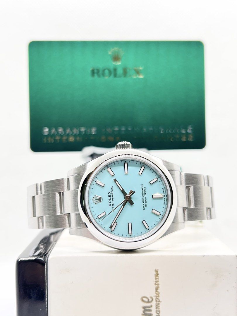 Brand New Rolex Oyster Perpetual 31 277200 Tiff Blue Dial Automatic Steel Casing Bracelet ( Oct 26 ) (Category: Watches) located in Singapore. Submitted by brightime (Listing ID 1468135664, Image 1). Description: Brand New Rolex Oyster Perpetual 31 277200 Tiff Blue Dial Automatic Steel Casing Bracelet ** Brand New ** ** Stickers Removed By AD ** Model : 277200 Also known as : Oyster Perpetual 31 Case size : 31mm Dial : Tiff Blue Dial With Luminou
