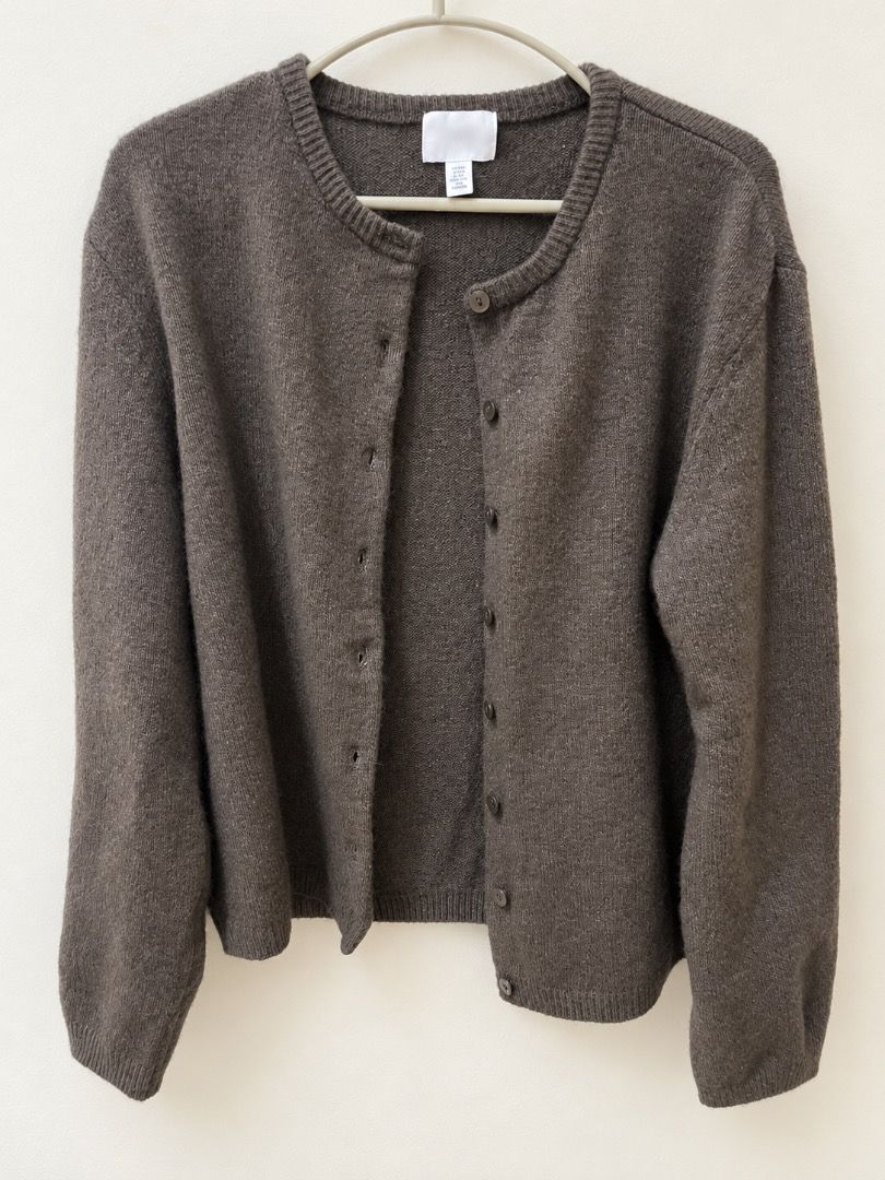 Brown Button-Up Knit Cardigan Sweater (Category: Coats, Jackets and Outerwear) located in Caloocan City. Submitted by sharalynal53723 (Listing ID 1468059268, Image 1). Description: Details: • Color: Brown • Style: Button-up cardigan sweater • Neckline: Crew neck • Sleeves: Long sleeves with ribbed cuffs and hem • Material: Soft, textured knit • Fit: Relaxed and comfortable • Size: Can fit Small to Semi-Medium.