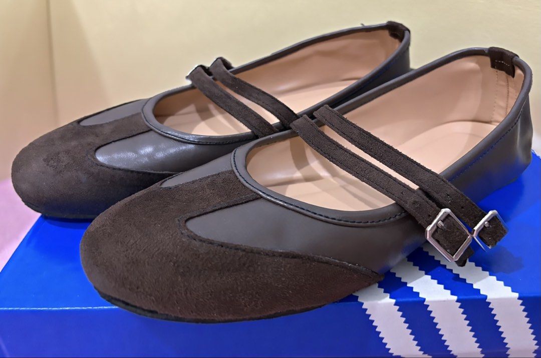 Brown double strap Mary Jane flats (Category: Flats & Sandals) located in Manila. Submitted by cherslugo (Listing ID 1468281023, Image 2). Description: - Style: Mary Jane flats with flat heel - Color: Brown with light beige inner lining - Material: Suede toe cap combined with smooth finish - Closure: Double side buckle straps for easy adjustment - Condition: Fresh pair.