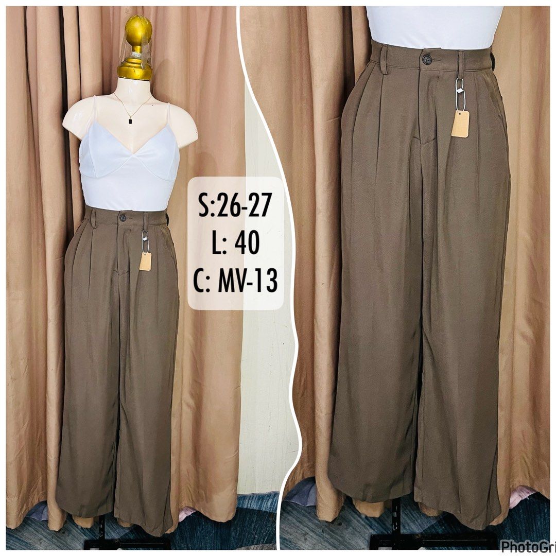 Brown High-Waisted Trousers (Category: Other Bottoms) located in Manila. Submitted by bengirlclothing (Listing ID 1468142199, Image 1). Description: - SIZE: 26-27 inches -LENGTH: 40 inches -Style: Brown wide-leg trousers with front pleats and clean minimalist design - Fit: High-waisted with belt loops and secure button closure - Versatility: Easy to style for work or casual days.