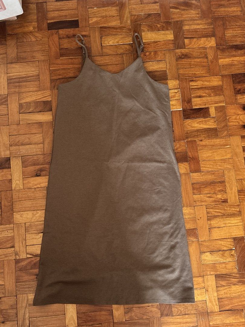 Brown spaghetti strap long dress (Category: Dresses) located in Las Pinas. Submitted by fwanchinee (Listing ID 1468115754, Image 1). Description: - got it at a pop up - never worn since its too big on me - fits xl-2xl Loc: Las Pinas.