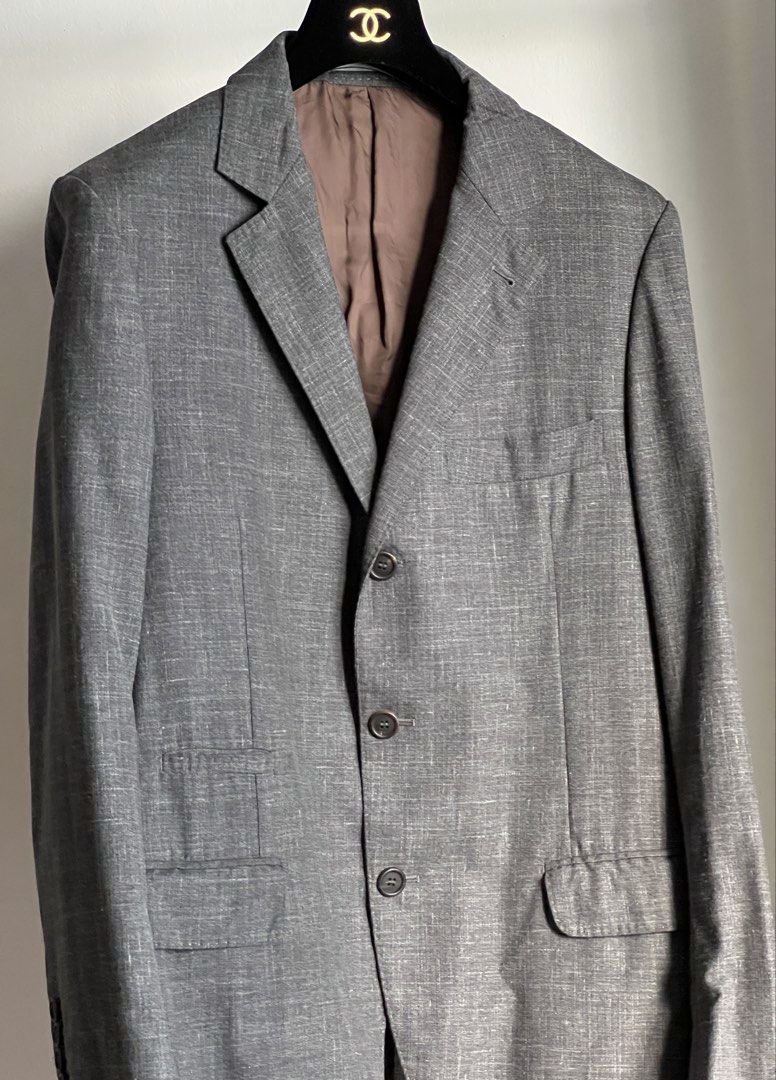 Brunello Cucinelli buggy-lined jacket (Category: Luxury Apparel) located in Quezon City. Submitted by raccoonfur (Listing ID 1468075585, Image 3). Description: Brunello Cucinelli summer wool blend unlined blazer. Interesting texture with artisanal pick stitching all around. Ideal for warmer climates. Lightweight with the roundedness of a true tailored garment. Great condition. Comes with garment bag. Flat measurements: Pit to pit 48.25cm/19in Wai