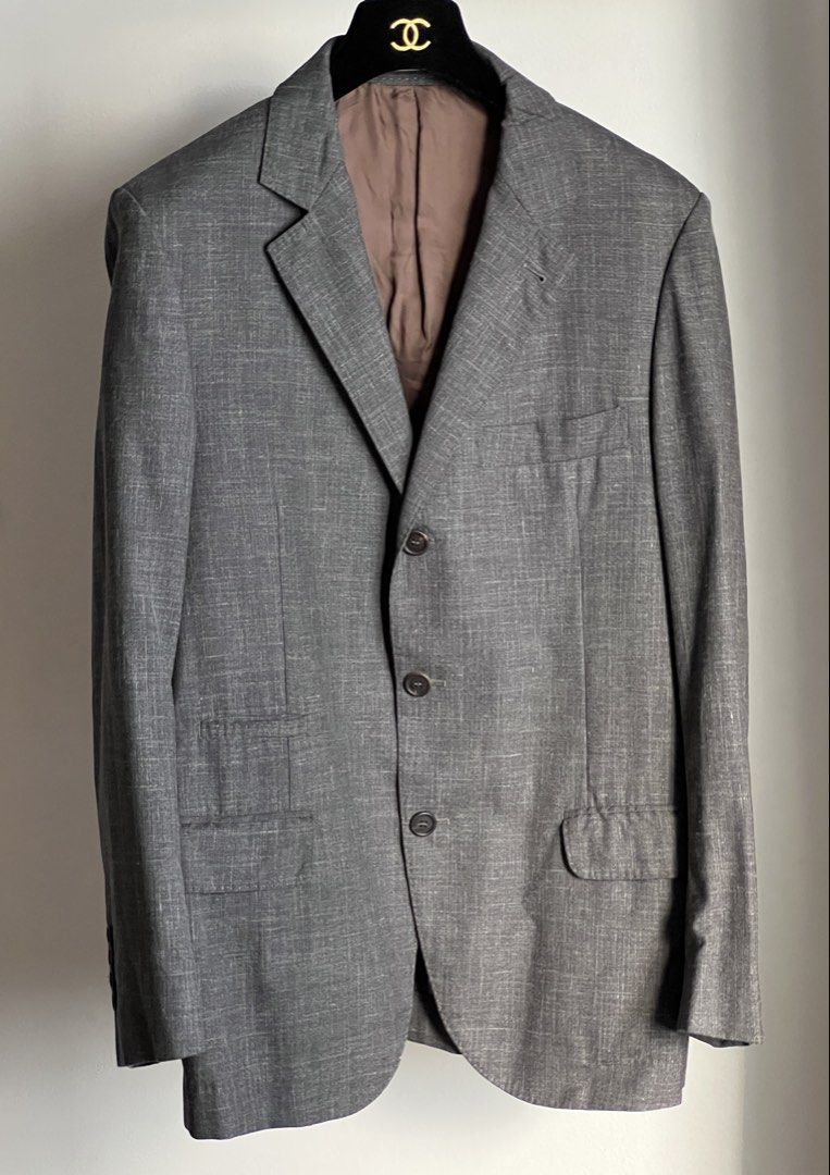 Brunello Cucinelli buggy-lined jacket (Category: Luxury Apparel) located in Quezon City. Submitted by raccoonfur (Listing ID 1468075585, Image 2). Description: Brunello Cucinelli summer wool blend unlined blazer. Interesting texture with artisanal pick stitching all around. Ideal for warmer climates. Lightweight with the roundedness of a true tailored garment. Great condition. Comes with garment bag. Flat measurements: Pit to pit 48.25cm/19in Wai