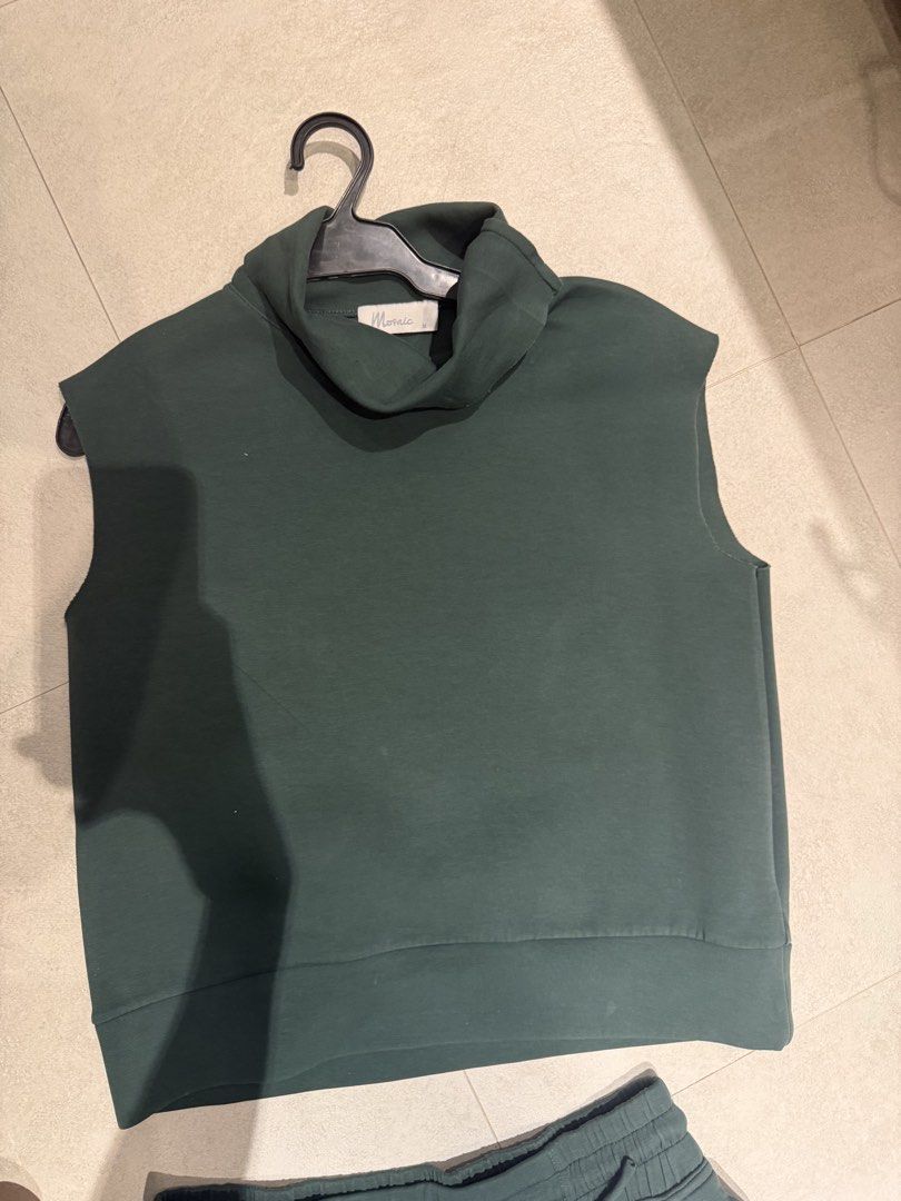 BUNDLE Mosaic Sleeveless Turtleneck Top And Shorts Set (Category: Sets or Coordinates) located in Makati City. Submitted by rockandraw (Listing ID 1468085409, Image 1). Description: - Brand: Mosaic - Size: M - Colors available: Dark green, white - Set includes: Sleeveless top with folded high collar and matching drawstring shorts - Material: Soft fabric with structure - Versatile: Wear as a complete set or mix and match with wardrobe basics.