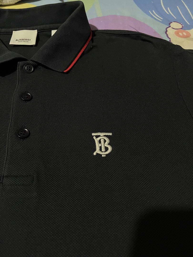 Burberry (Category: Tshirts & Polo Shirts ) located in Cebu City. Submitted by pickthethrift (Listing ID 1468087075, Image 3). Description: Excellent condition No issue 9/10 color rate W-20 L-28.