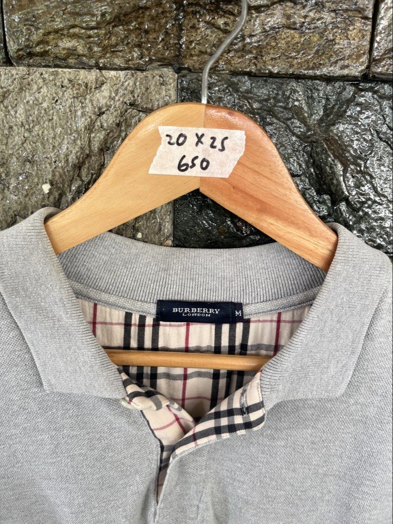 Burberry Gray Poloshirt (Category: Tshirts & Polo Shirts ) located in Cagayan de Oro. Submitted by curatedheirloomph_ (Listing ID 1468230963, Image 2). Description: 𝘿𝙞𝙢𝙚𝙣𝙨𝙞𝙤𝙣𝙨: 20x25 𝘽𝙚𝙨𝙩 𝙁𝙞𝙩: Small - Medium 𝘾𝙤𝙣𝙙𝙞𝙩𝙞𝙤𝙣 & 𝘾𝙤𝙡𝙤𝙧 𝙍𝙖𝙩𝙚: Excellent (9.5/10) 𝙄𝙨𝙨𝙪𝙚: Needs wash.