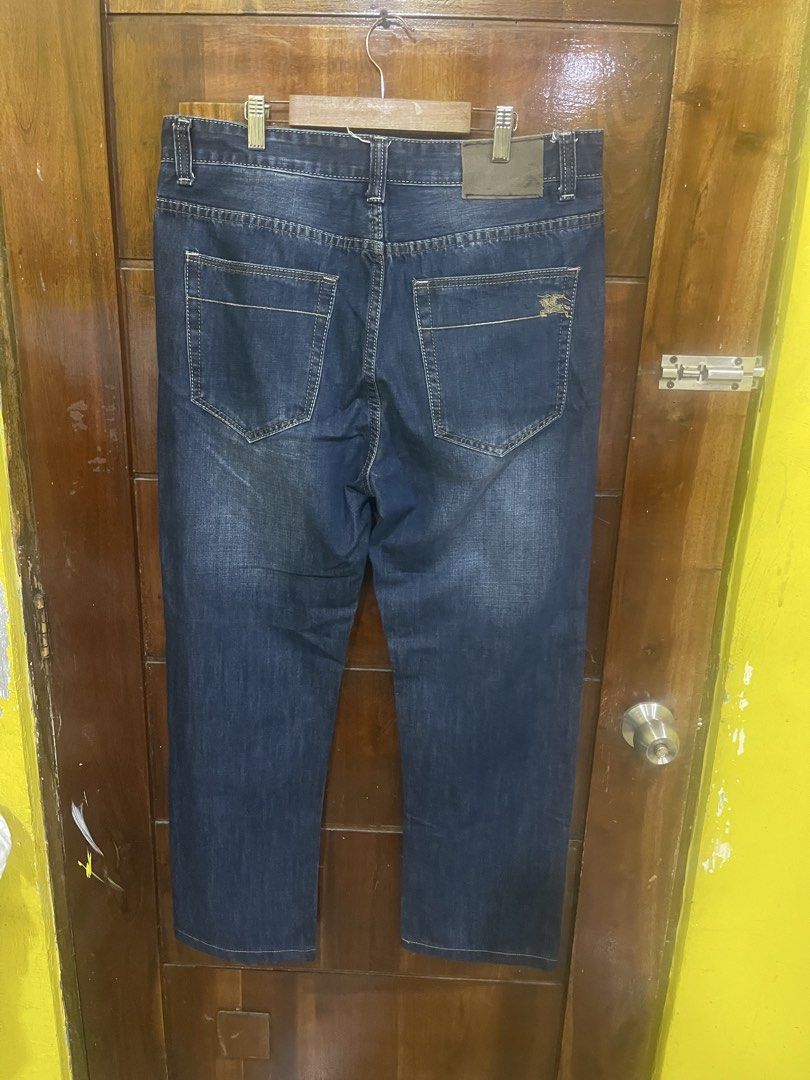 Burberry Jeans (Category: Jeans) located in Marikina City. Submitted by greatfindsmnlph (Listing ID 1468065803, Image 2). Description: Bur berry Jeans Price: 300 Size: Large Waistline: 34 Length: 40 Hemline: 8.5 Color: Blue Color Rate: 10/10 Condition: 9.8/10 damaged patch Very nice in actual.