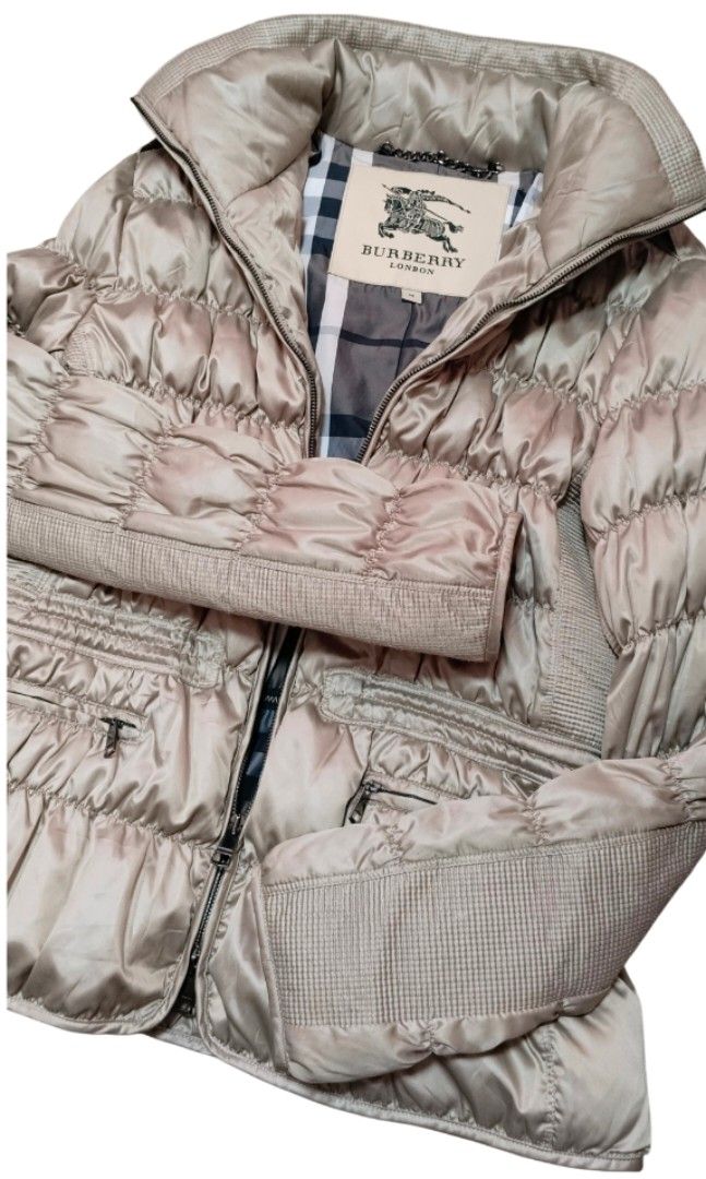 Burberry London Goose Down Puffer Jacket (Category: Luxury Apparel) located in Caloocan City. Submitted by modishthriftstore (Listing ID 1468178337, Image 2). Description: NO Worn photo Pls refer to measurements NO "LP ? " question, make your best offer NO "available? " question, available until posted here S-L S:18 C: 21 Hip 26 inches long Adjustable Waist with inner drawstring Light Clary SAGE Color Made In Hongkong Loc: North Caloocan.