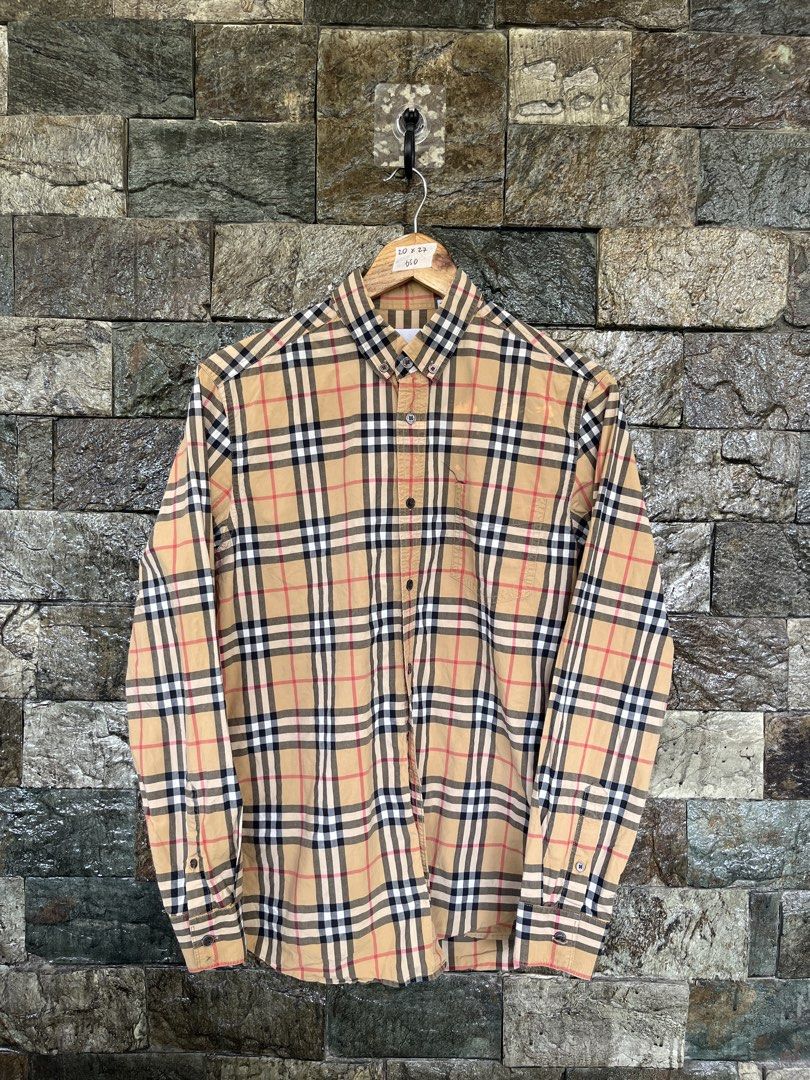 Burberry Plaid Longsleeve (Category: Formal Shirts) located in Cagayan de Oro. Submitted by curatedheirloomph_ (Listing ID 1468239469, Image 1). Description: 𝘿𝙞𝙢𝙚𝙣𝙨𝙞𝙤𝙣𝙨: 20x27 𝘽𝙚𝙨𝙩 𝙁𝙞𝙩: Medium 𝘾𝙤𝙣𝙙𝙞𝙩𝙞𝙤𝙣 & 𝘾𝙤𝙡𝙤𝙧 𝙍𝙖𝙩𝙚: Very Good (9/10) 𝙄𝙨𝙨𝙪𝙚: Slight discoloration 𝘼𝙪𝙩𝙝𝙚𝙣𝙩𝙞𝙘𝙞𝙩𝙮 𝘿𝙚𝙘𝙡𝙖𝙧𝙖𝙩𝙞𝙤𝙣: Authentic.