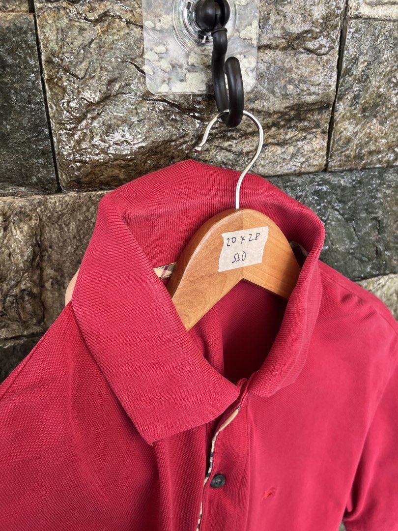 Burberry Red Monotone Poloshirt (Category: Tshirts & Polo Shirts ) located in Cagayan de Oro. Submitted by curatedheirloomph_ (Listing ID 1468089536, Image 3). Description: 𝘿𝙞𝙢𝙚𝙣𝙨𝙞𝙤𝙣𝙨: 20x28 𝘽𝙚𝙨𝙩 𝙁𝙞𝙩: Medium - Large 𝘾𝙤𝙣𝙙𝙞𝙩𝙞𝙤𝙣 & 𝘾𝙤𝙡𝙤𝙧 𝙍𝙖𝙩𝙚: Excellent (9.5/10) 𝙄𝙨𝙨𝙪𝙚: Collar lining 𝘼𝙪𝙩𝙝𝙚𝙣𝙩𝙞𝙘𝙞𝙩𝙮 𝘿𝙚𝙘𝙡𝙖𝙧𝙖𝙩𝙞𝙤𝙣: Authentic.