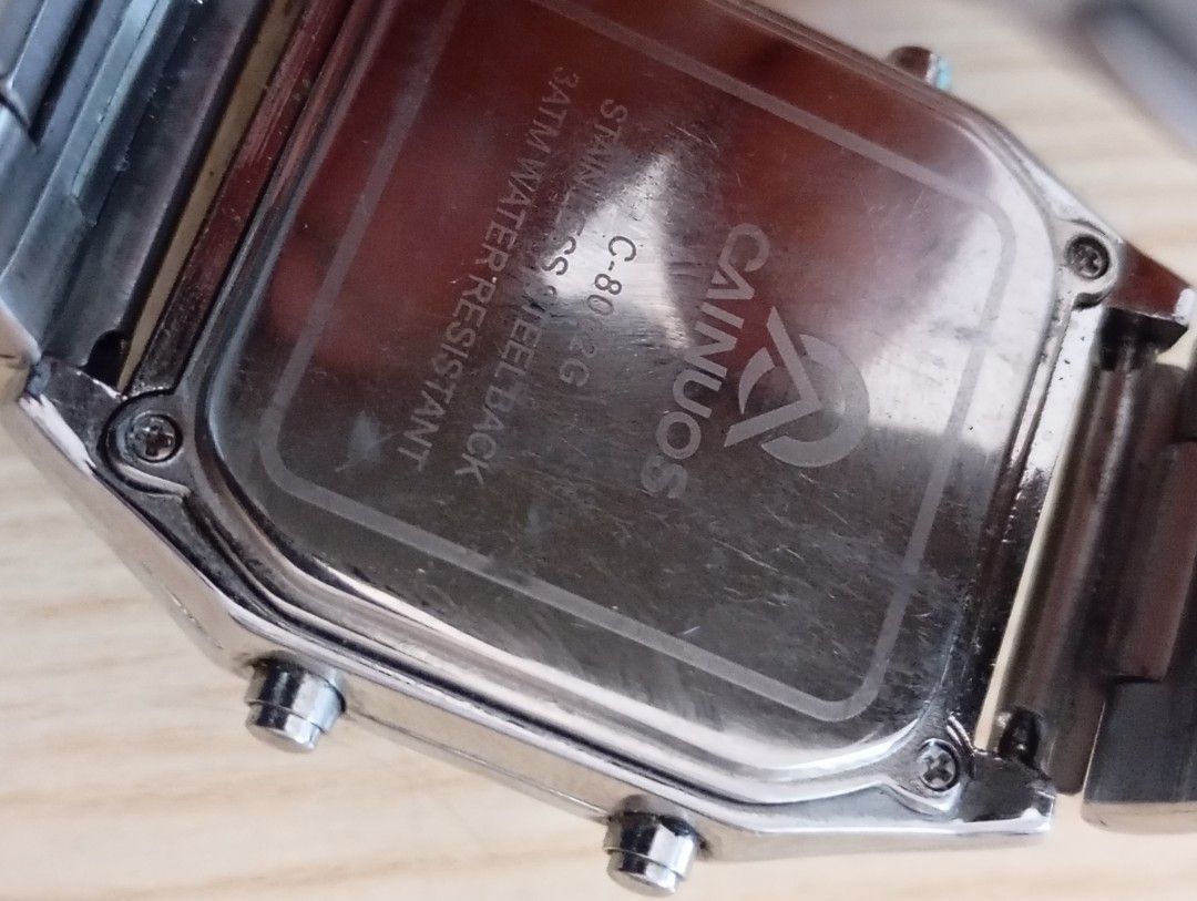 Cainuos (Category: Men's Watches) located in Las Pinas. Submitted by quick_deals_great_finds2 (Listing ID 1468094434, Image 3). Description: Original good working condition Fully functional with battery Small wrist size 6.3 inches.