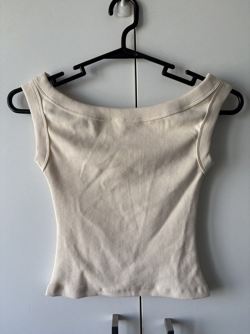 Candy Ivory Tank Top - Small (Category: Sleeveless) located in Quezon City. Submitted by misserika (Listing ID 1468068442, Image 2). Description: - Brand: Candy - Size: Small - Color: Ivory - Material: Soft, stretchy ribbed fabric - Condition: New - RFS: Color is unflattering on me 😅.