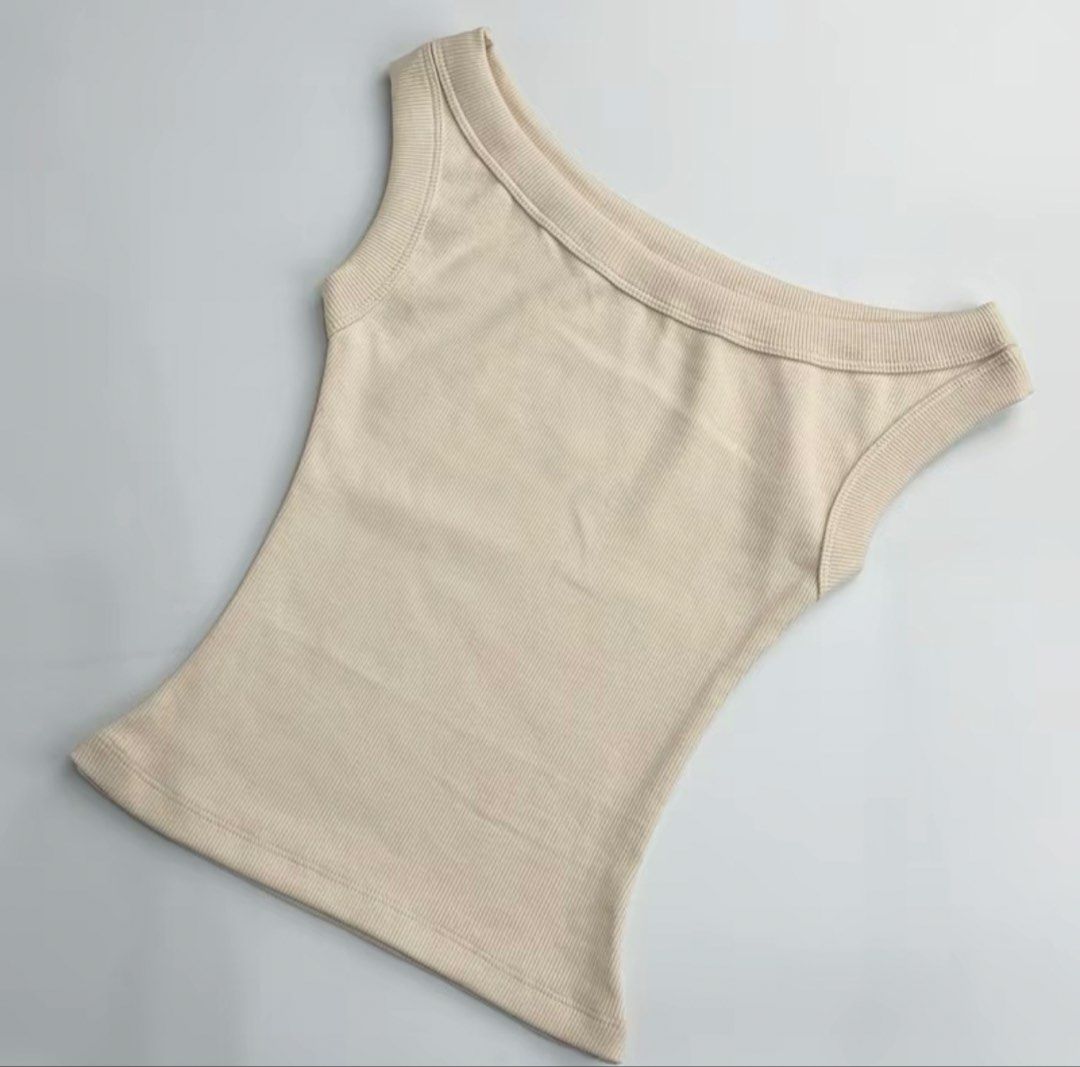 Candy Ivory Tank Top - Small (Category: Sleeveless) located in Quezon City. Submitted by misserika (Listing ID 1468068442, Image 1). Description: - Brand: Candy - Size: Small - Color: Ivory - Material: Soft, stretchy ribbed fabric - Condition: New - RFS: Color is unflattering on me 😅.