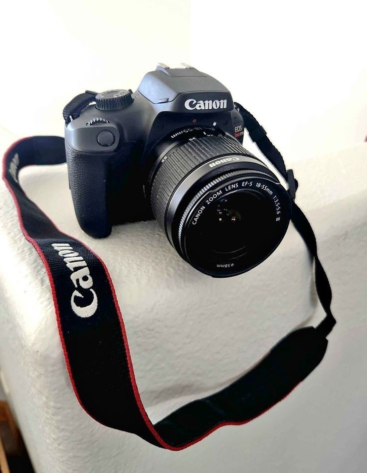 Canon EOS 700D DSLR Camera with 18-55mm Lens (Category: Cameras) located in Manila. Submitted by royalphoenix_11ec92 (Listing ID 1468083647, Image 3). Description: - Canon EOS 700D DSLR camera body in clean condition - EF-S 18-55mm f/3.5-5.6 IS STM zoom lens with clear glass - Includes original branded black neck strap with red piping - Fully tested and 100% working condition - Ideal for photography projects, street shooting, and learning manual 