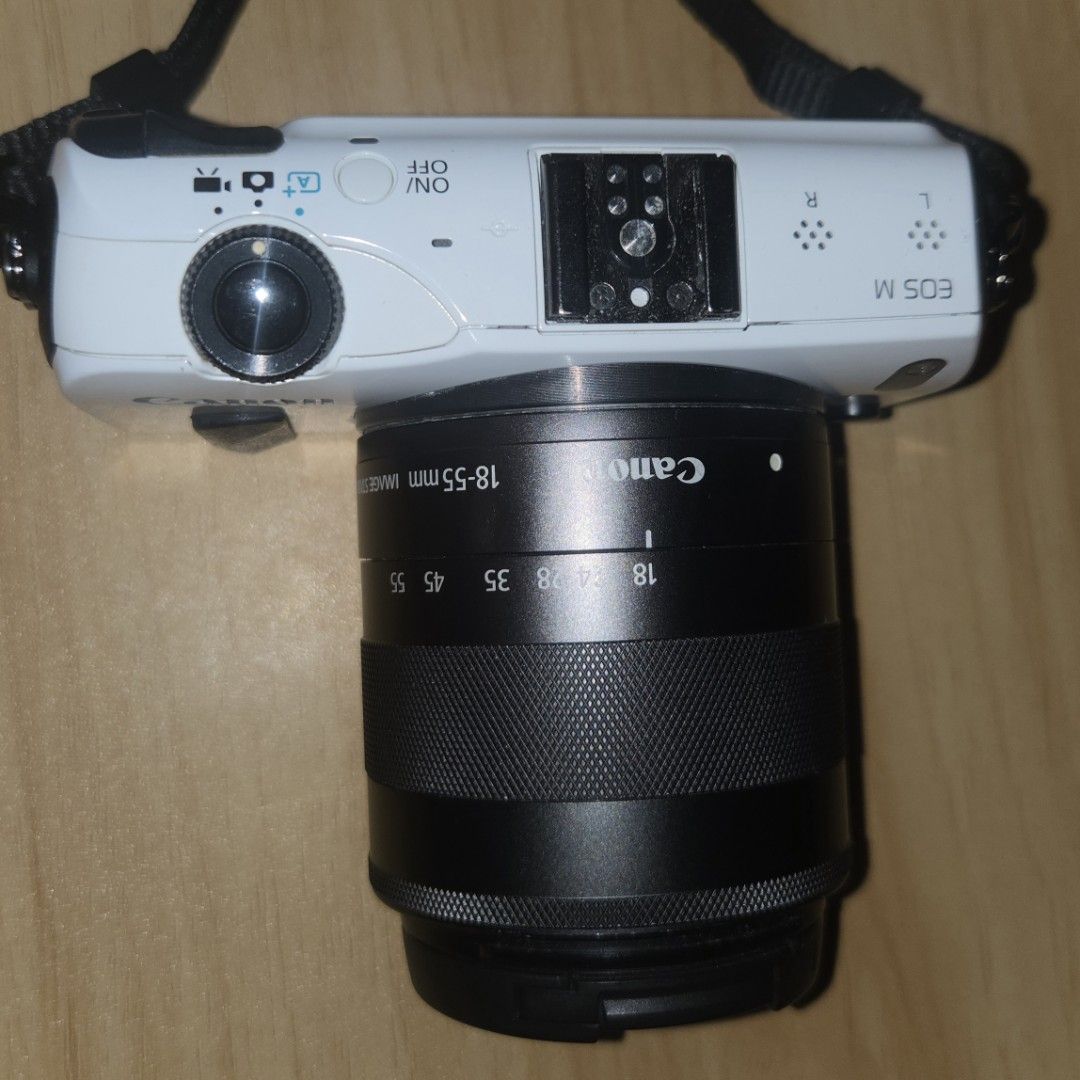 Canon EOS M Mirrorless Camera with 18-55mm Lens (Category: Cameras) located in Makati City. Submitted by ali_yvo (Listing ID 1468256644, Image 3). Description: Camera: Canon EOS M Mirrorless Body (White) - Lens: EF-M 18-55mm f/3.5-5.6 IS STM Zoom Lens - Condition: Clean body and glass, 100% working condition - Perfect compact setup for everyday shooting and travel Complete Package with: -Body, lens -Lens cover -Battery -Charger -Strap -Camera bag