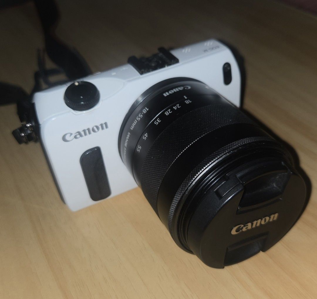 Canon EOS M Mirrorless Camera with 18-55mm Lens (Category: Cameras) located in Makati City. Submitted by ali_yvo (Listing ID 1468256644, Image 1). Description: Camera: Canon EOS M Mirrorless Body (White) - Lens: EF-M 18-55mm f/3.5-5.6 IS STM Zoom Lens - Condition: Clean body and glass, 100% working condition - Perfect compact setup for everyday shooting and travel Complete Package with: -Body, lens -Lens cover -Battery -Charger -Strap -Camera bag