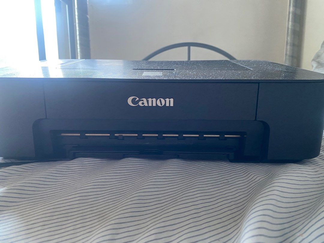 Canon PIXMA TS207 Inkjet Printer (Category: Printers, Scanners & Copiers) located in Quezon City. Submitted by padrinogg2 (Listing ID 1468107027, Image 2). Description: - Model: Canon PIXMA TS207 (Black) - Function: Compact single-function printer ideal for basic home use - Paper Handling: Supports sizes up to A4, 4x6, and L sizes via standard rear feed - Design: Simple control panel with power and resume buttons; space-saving footprint - Connect