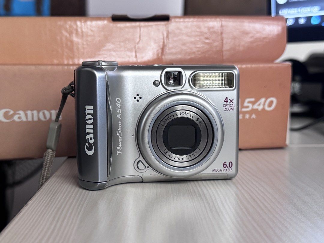 Canon PowerShot A540 Digital Camera with Box and Case (Category: Cameras) located in Manila. Submitted by cruzgiusep32732 (Listing ID 1468122650, Image 1). Description: Canon Powershot A540 - Body condition: 9.8/10 Includes: 💼 - unit - battery (AA) - 2gb SD Card - strap - pouch - original box Specs: ✍️ - Color: silver - 6mp - Image sensor: 1/2.5-inch CCD ￼ - Lens: 5.8 mm (W) – 23.2 mm (T) (35 mm-film equivalent: 35-140 mm) ￼ - Maximum aperture: 