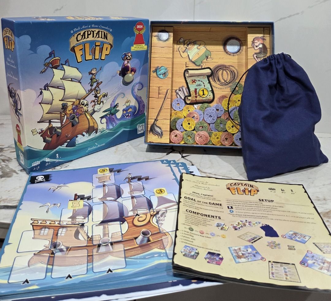 Captain Flip Board Game by Play Punk (Category: Board Games & Puzzles) located in Caloocan City. Submitted by caiwilmer (Listing ID 1468179069, Image 1). Description: Captain Flip — Family Board Game (Playagame / PlayMonster) Captain Flip by Paolo Mori & Remo Conzadori—the fast, fun press-your-luck pirate game nominated for the prestigious 2024 Spiel des Jahres! “Hoist your flag, recruit a crew, and fill your coffers with shiny gold coins! On you