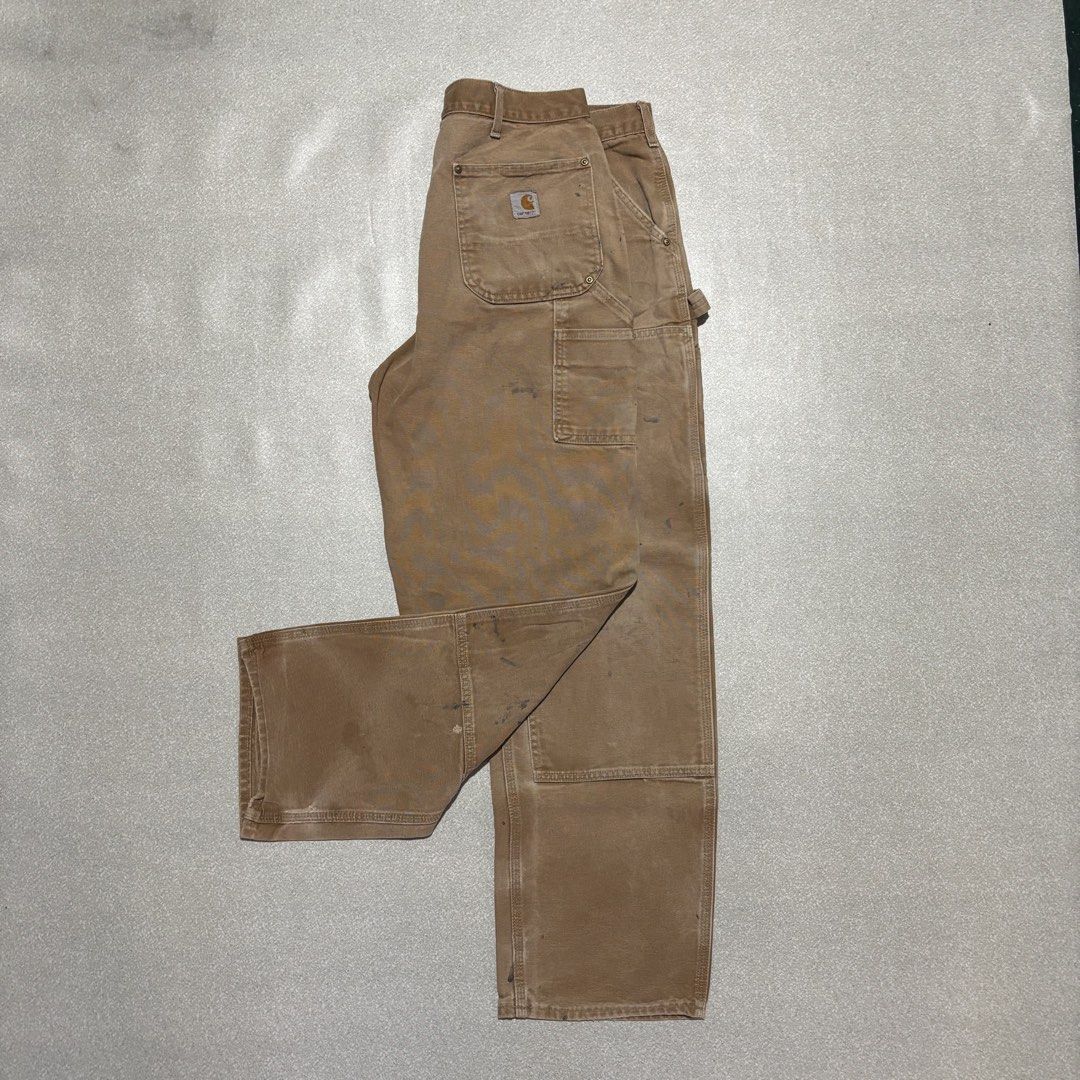 Carhartt B01 BRN Double Front Work Pants 38x32 (Category: Jeans) located in Cavite. Submitted by thrift_yard_blvd (Listing ID 1468185445, Image 1). Description: Carhartt Double Knee Carpenter Pants Size: 38x32 on the tag. Waist 38in Length 42in Leg Opening 9in Condition: Lightly used (super crispy). Issue: Workwear stains. Mine: 3500 pesos.