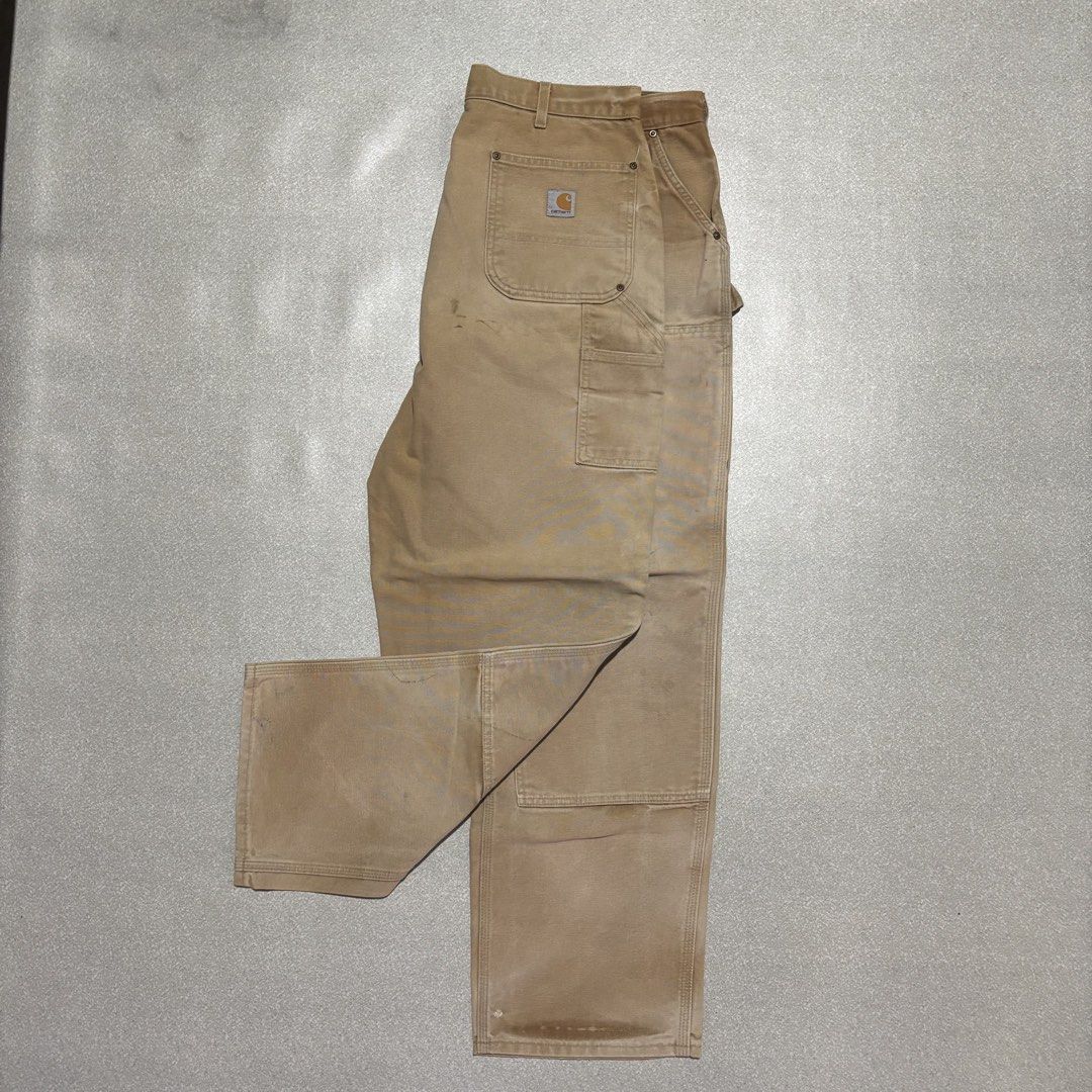 Carhartt B01 BRN Double Front Work Pants Brown (Category: Jeans) located in Cavite. Submitted by thrift_yard_blvd (Listing ID 1468185601, Image 1). Description: Carhartt Double Knee Carpenter Pants Size: 38x32 on the tag. Waist 38in Length 43in Leg Opening 9.5in Condition: Lightly used (super crispy). Issue: Minimal workwear stains. Mine: 3500 pesos.