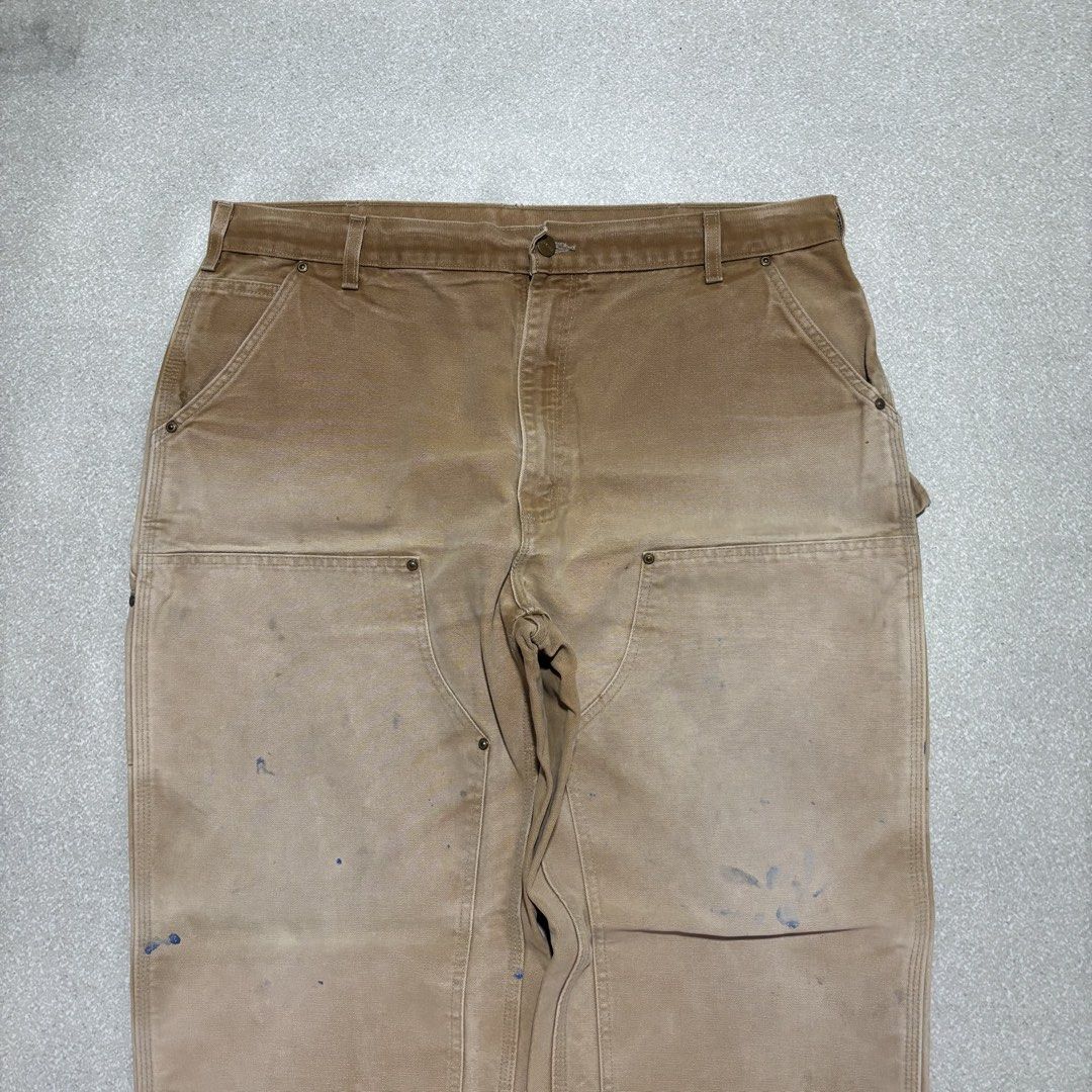 Carhartt B01 BRN Double Front Work Pants Brown (Category: Jeans) located in Cavite. Submitted by thrift_yard_blvd (Listing ID 1468185601, Image 3). Description: Carhartt Double Knee Carpenter Pants Size: 38x32 on the tag. Waist 38in Length 43in Leg Opening 9.5in Condition: Lightly used (super crispy). Issue: Minimal workwear stains. Mine: 3500 pesos.