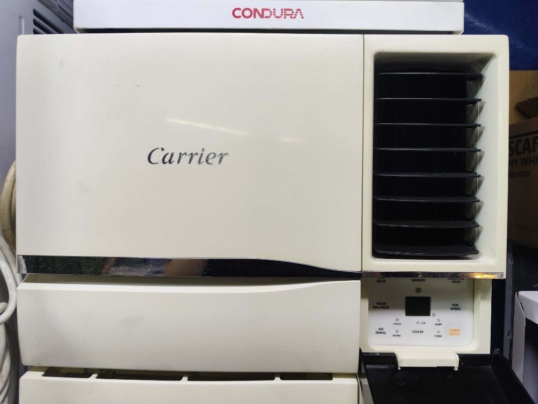 Carrier icool series Window Type Air Conditioner (Category: Air Conditioning and Heating) located in Manila. Submitted by bryanadams.9 (Listing ID 1468073040, Image 1). Description: - Brand/Type: Carrier Window Type Air Conditioner - Color: Cream White - Controls: Digital display with buttons for power, cooler, air swing, and fan speed - Airflow: Standard horizontal louvers on the right side - Condition: Sturdy front grille casing, ready to use -