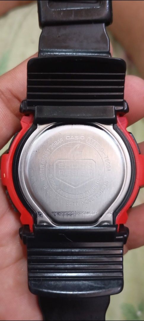 Casio G-Shock G-7900A Red Black Digital Watch (Category: Men's Watches) located in Manila. Submitted by jhonevanma58082 (Listing ID 1468059649, Image 2). Description: - Model: Casio G-Shock G-7900A (Bright Red Bezel & Black Resin Strap) - Functions: Moon and Tide Graph, Low Temp LCD Display, Backlight (tested and working) - Durability: Shock Resistant, 20 Bar (200M) Water Resistant - Condition: Standard wear on strap and case from normal use; cle