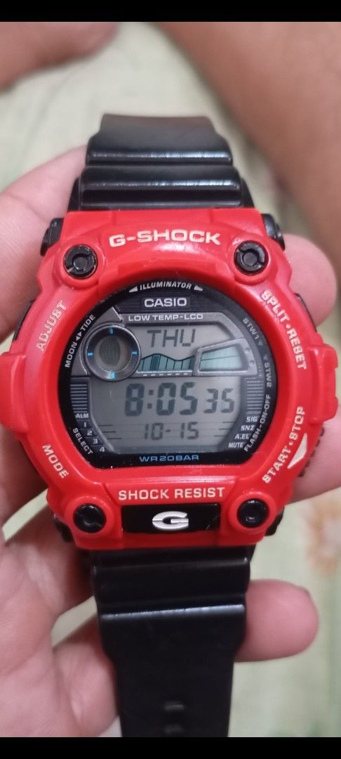 Casio G-Shock G-7900A Red Black Digital Watch (Category: Men's Watches) located in Manila. Submitted by jhonevanma58082 (Listing ID 1468059649, Image 1). Description: - Model: Casio G-Shock G-7900A (Bright Red Bezel & Black Resin Strap) - Functions: Moon and Tide Graph, Low Temp LCD Display, Backlight (tested and working) - Durability: Shock Resistant, 20 Bar (200M) Water Resistant - Condition: Standard wear on strap and case from normal use; cle