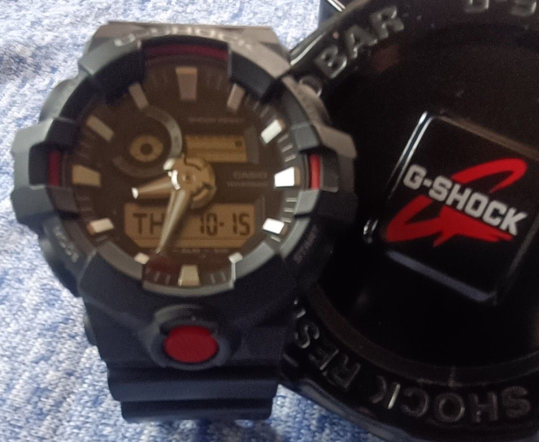 Casio G-Shock GA-700 (5522) – Black-Red (Category: Men's Watches) located in Davao. Submitted by scaras (Listing ID 1466107396, Image 2). Description: Note: > Purchased on Sept. 4, 2026 as “Pawnpaper for Sale.” > Slightly used- Unnoticeable scratch marks. > All functions still in perfect condition. > Comes with a replacement Tin Can (nothing else) • Meet-up: Dumoy (Davao City) Area Case and Design: • Dimensions (L × W × H): 57.5 × 53.4 × 18.4 mm 