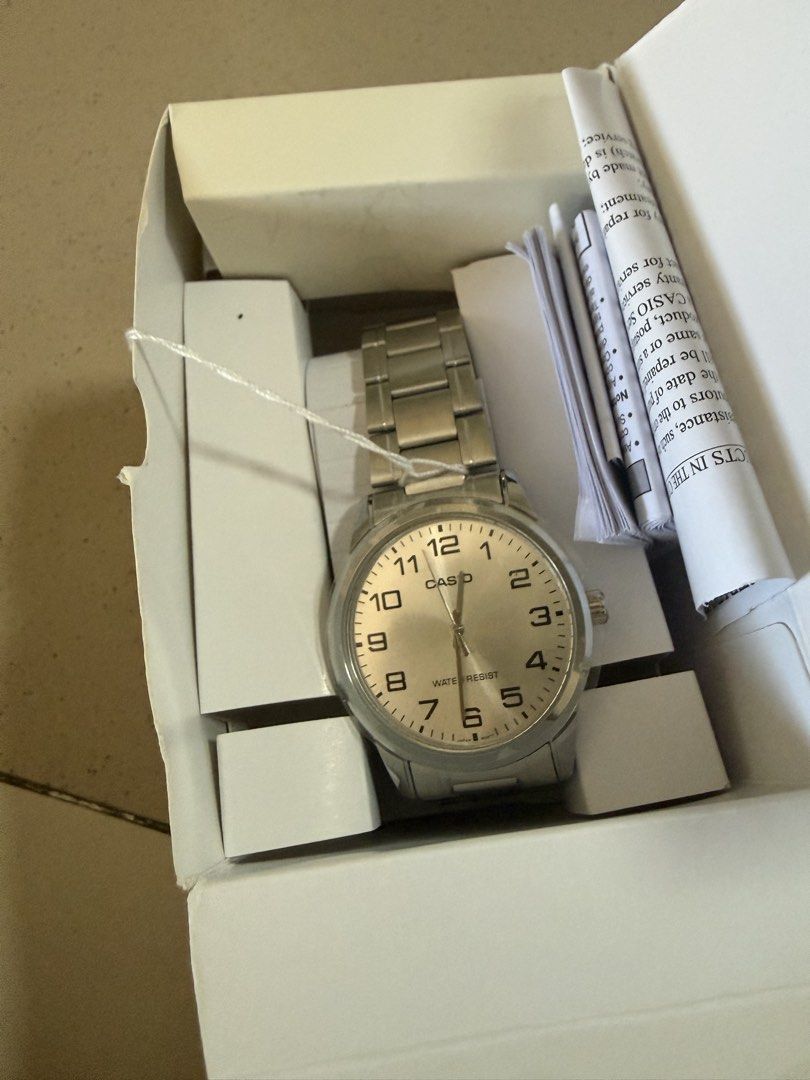 Casio MTP-V001D-7BUDF Analog Watch (Category: Men's Watches) located in Manila. Submitted by merry.merchant (Listing ID 1468092665, Image 1). Description: - Brand new, unworn condition - Classic silver dial - Durable stainless steel strap and case - Water-resistant for everyday use - Complete set: includes original box, hang tag, product manual papers and warranty card - bought Aug 30, 2026.