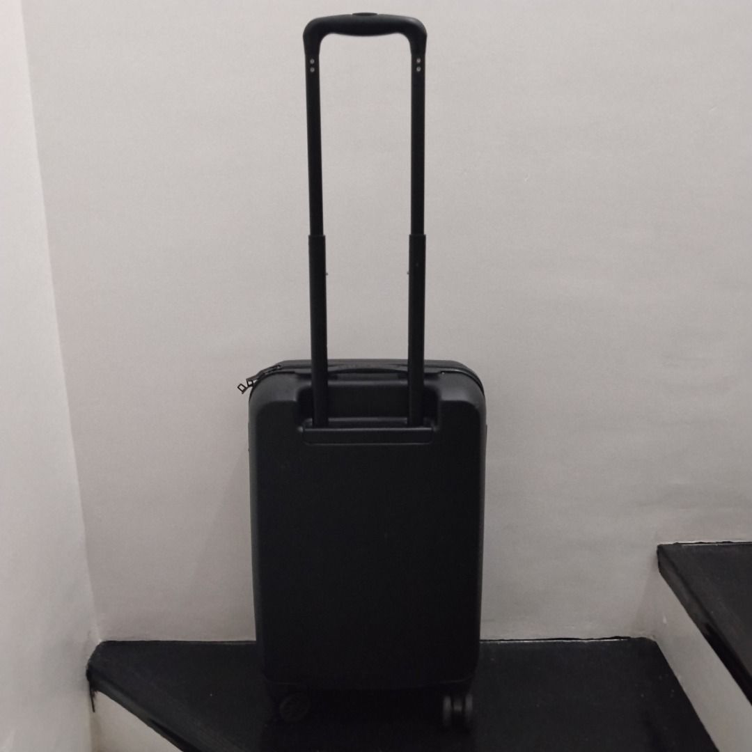 CAT Black Hard Shell Suitcase Trolley Luggage (Category: Luggage) located in Cavite. Submitted by msgs_2827 (Listing ID 1468116404, Image 2). Description: For Sale: CAT 20 inch Cabin Luggage Color: Black Condition: Only used once - in very good condition! Actual Measurements (including the wheels): Height: 21 inches Width: 14 inches Depth: 8 inches - Color: Sleek black with a prominent embossed Caterpillar (CAT) logo - Mobility: Smooth telescopic