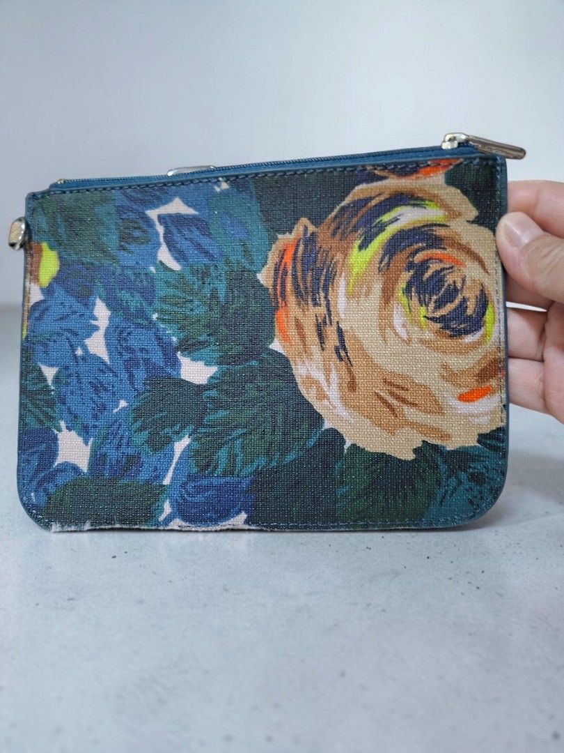CATH KIDSTON POUCH (Category: Purses & Pouches) located in Las Pinas. Submitted by annachiaonair2037 (Listing ID 1468091500, Image 2). Description: CATH KIDSTON POUCH FROM JAPAN PVC LEATHER H 5" L 7" Disclaimer: I am not affiliated with, associated with, or authorized by any of the brands featured posted. Any mention of brand names, trademarks, or logos is solely for identification and reference purposes only..